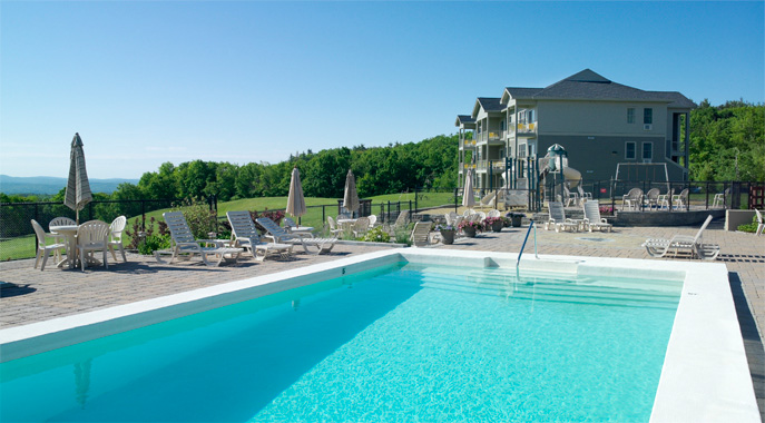 The outdoor pool and a view of Steele Hill South